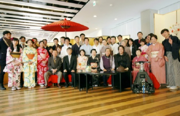 A group of people wearing traditional Japanese costumes.